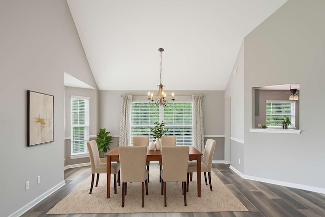 7607 Birdsong Ct, Fairview, TN 37062 - dining room featuring a chandelier, dark wood-style flooring, healthy amount of natural light, and high vaulted ceiling