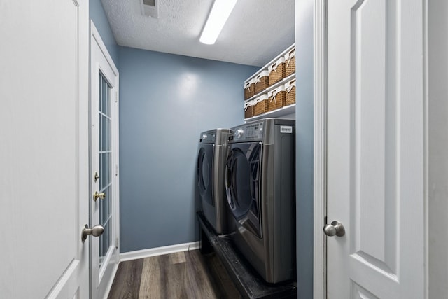 7607 Birdsong Ct, Fairview, TN 37062 - laundry room with washer and dryer, dark wood-type flooring, and a textured ceiling