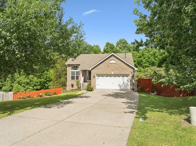7607 Birdsong Ct, Fairview, TN 37062 - view of front of house featuring brick siding, concrete driveway, a garage, and roof with shingles