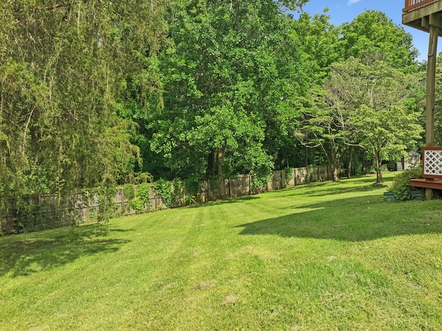 7607 Birdsong Ct, Fairview, TN 37062 - fenced backyard featuring a wooden deck