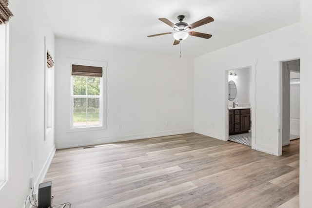4486 Beards Chapel Rd, Springfield, TN 37172 - unfurnished bedroom with light wood-style floors, ensuite bath, and ceiling fan