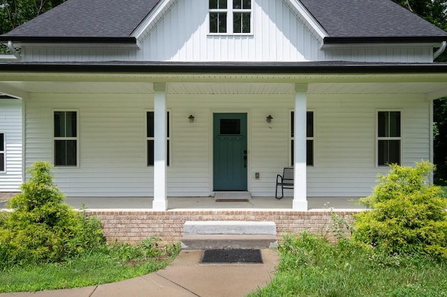 4486 Beards Chapel Rd, Springfield, TN 37172 - view of front facade with covered porch, board and batten siding, and a shingled roof