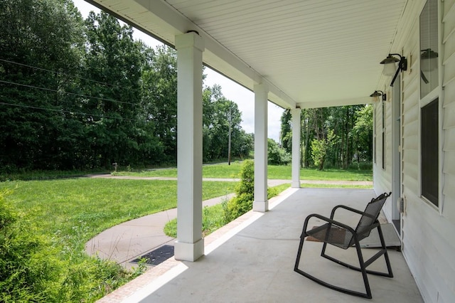 4486 Beards Chapel Rd, Springfield, TN 37172 - porch with a yard and view of scattered trees