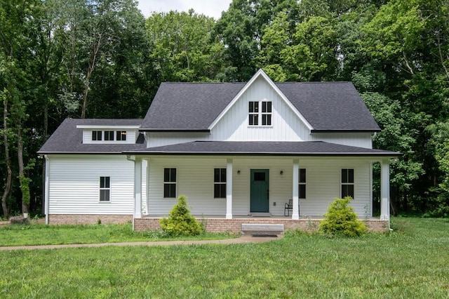 4486 Beards Chapel Rd, Springfield, TN 37172 - view of front of property with a front lawn, covered porch, and roof with shingles