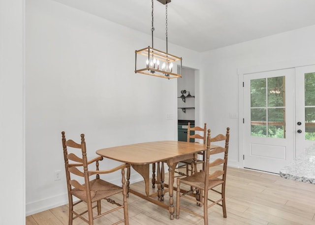 4486 Beards Chapel Rd, Springfield, TN 37172 - dining room featuring a chandelier and light wood-type flooring