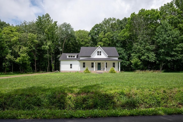 4486 Beards Chapel Rd, Springfield, TN 37172 - view of front of property with a porch, a front yard, and a view of trees