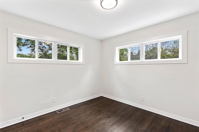 610 Maple Ln, Chattanooga, TN 37411 - spare room with baseboards and dark wood finished floors