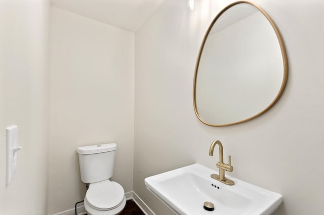 610 Maple Ln, Chattanooga, TN 37411 - half bathroom with a sink and toilet
