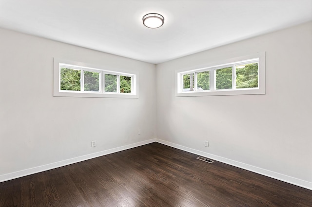 610 Maple Ln, Chattanooga, TN 37411 - empty room with baseboards and dark wood-style floors