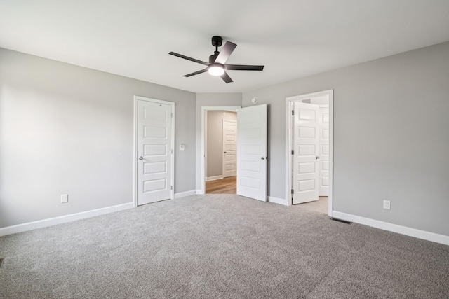 578 Oak Glen Dr, Smithville, TN 37166 - unfurnished bedroom with carpet flooring, ceiling fan, and ensuite bathroom