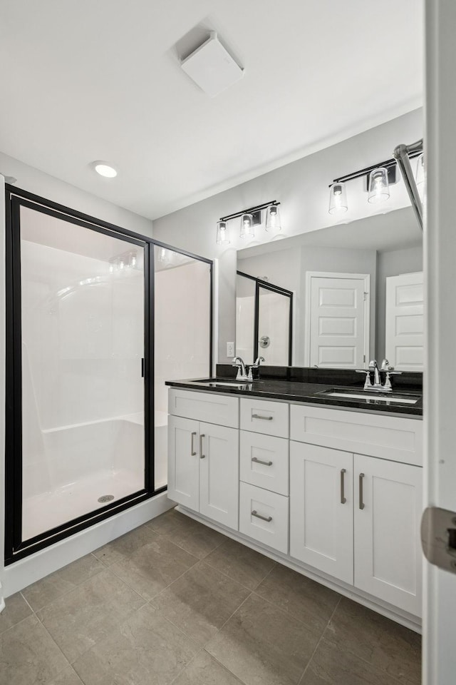 578 Oak Glen Dr, Smithville, TN 37166 - bathroom featuring double vanity and a stall shower