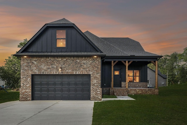 578 Oak Glen Dr, Smithville, TN 37166 - view of front of home featuring board and batten siding, driveway, a front yard, and brick siding