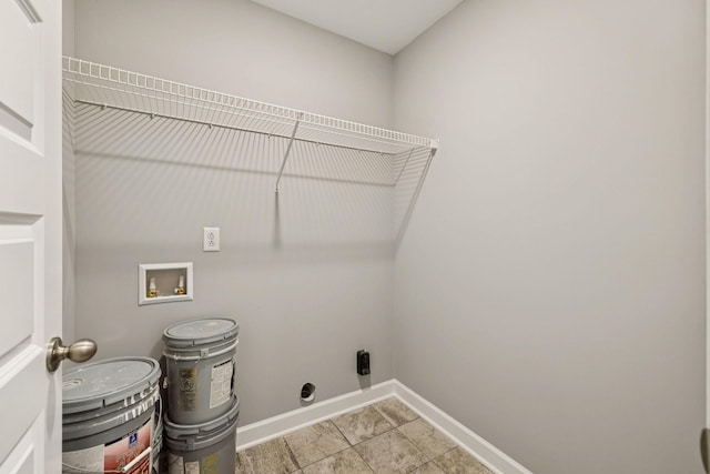 578 Oak Glen Dr, Smithville, TN 37166 - laundry area with washer hookup, electric dryer hookup, and light tile patterned floors