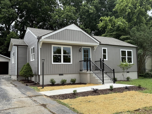 1913 Morris Ave, Columbia, TN 38401 - view of front of property with a shingled roof, crawl space, and an outbuilding