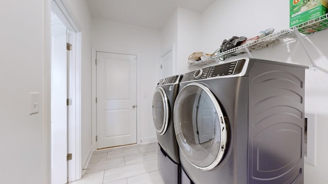 220 Young Ln, Pleasant View, TN 37146 - laundry area featuring washer and dryer and light tile patterned flooring