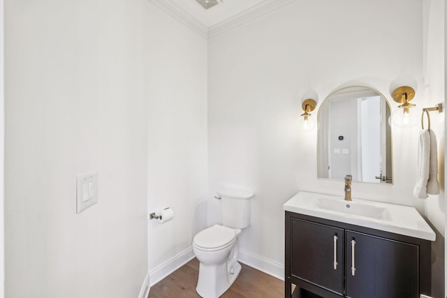 311 Wandering Cir, Franklin, TN 37067 - half bathroom featuring vanity, wood finished floors, and ornamental molding
