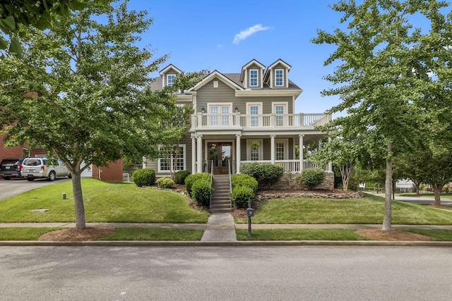 311 Wandering Cir, Franklin, TN 37067 - view of front facade featuring a porch, a front lawn, stairway, and driveway