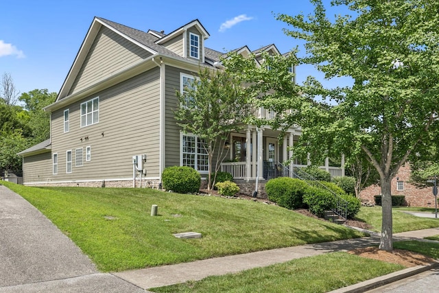 311 Wandering Cir, Franklin, TN 37067 - view of property exterior featuring covered porch and a yard