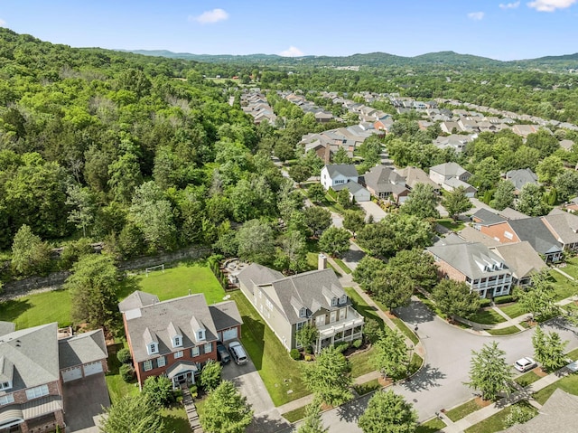 311 Wandering Cir, Franklin, TN 37067 - aerial perspective of suburban area featuring a heavily wooded area and a mountain backdrop