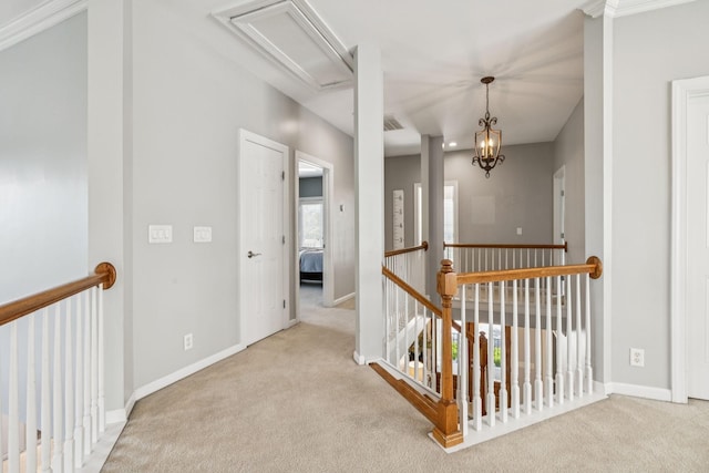 311 Wandering Cir, Franklin, TN 37067 - hallway featuring carpet flooring, an upstairs landing, and attic access