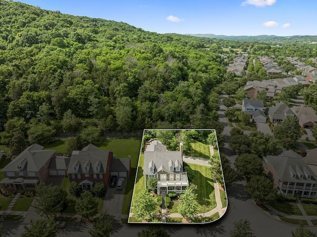 311 Wandering Cir, Franklin, TN 37067 - aerial perspective of suburban area featuring a heavily wooded area and property parcel outlined