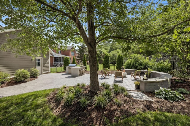 311 Wandering Cir, Franklin, TN 37067 - view of patio featuring a fire pit and area for grilling