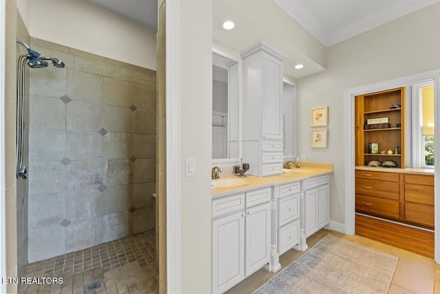2091 Wesley Chapel Rd, Pikeville, TN 37367 - bathroom with a tile shower, double vanity, ornamental molding, and recessed lighting