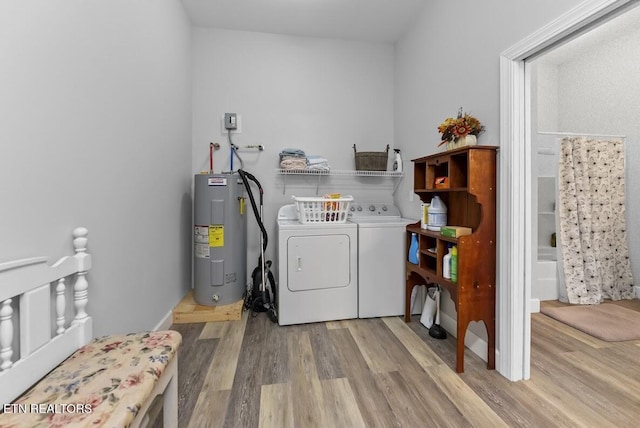 2091 Wesley Chapel Rd, Pikeville, TN 37367 - laundry room featuring electric water heater, washer and clothes dryer, and wood finished floors