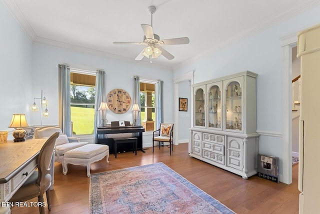 2091 Wesley Chapel Rd, Pikeville, TN 37367 - living area featuring wood finished floors, ceiling fan, and crown molding