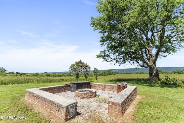 2091 Wesley Chapel Rd, Pikeville, TN 37367 - view of patio with an outdoor fire pit