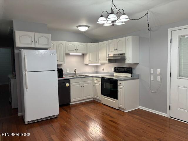 337 Bellview Rd, Pikeville, TN 37367 - kitchen with freestanding refrigerator, range with electric cooktop, black dishwasher, under cabinet range hood, and a chandelier
