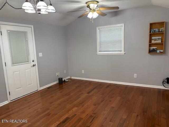 337 Bellview Rd, Pikeville, TN 37367 - empty room with vaulted ceiling, a chandelier, wood finished floors, and a ceiling fan
