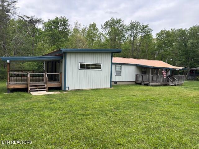 337 Bellview Rd, Pikeville, TN 37367 - back of property featuring a lawn and a deck