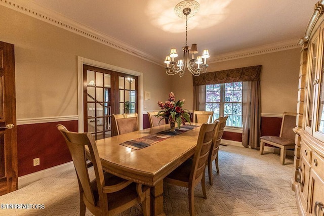 233 Nine Mile Cross Rd, Pikeville, TN 37367 - dining area with a chandelier, ornamental molding, french doors, and light colored carpet