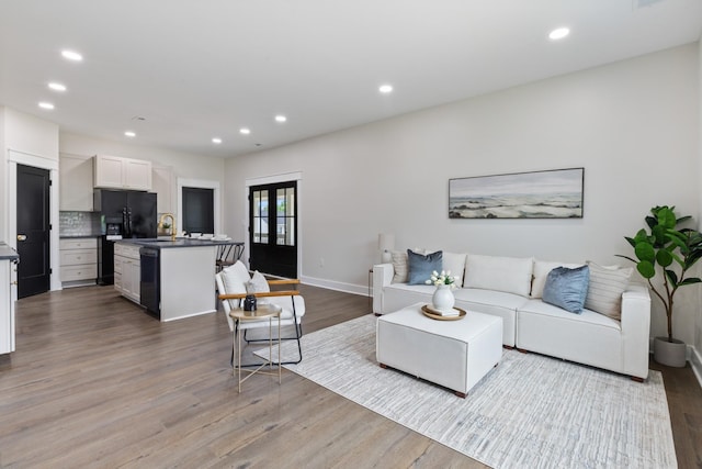 312 N Main St, Dickson, TN 37055 - living area featuring wood finished floors and recessed lighting