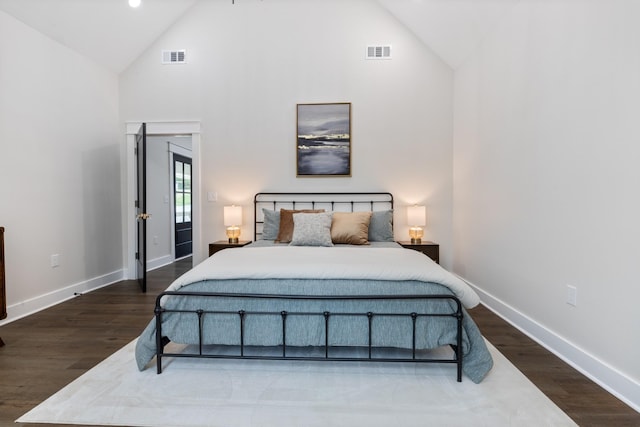 312 N Main St, Dickson, TN 37055 - bedroom featuring high vaulted ceiling and dark wood finished floors