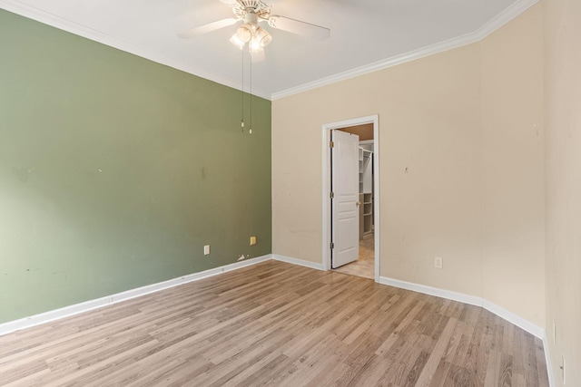 245 Northcrest Commons Cir, Nashville, TN 37211 - unfurnished bedroom featuring light wood-type flooring, crown molding, a spacious closet, a closet, and ceiling fan