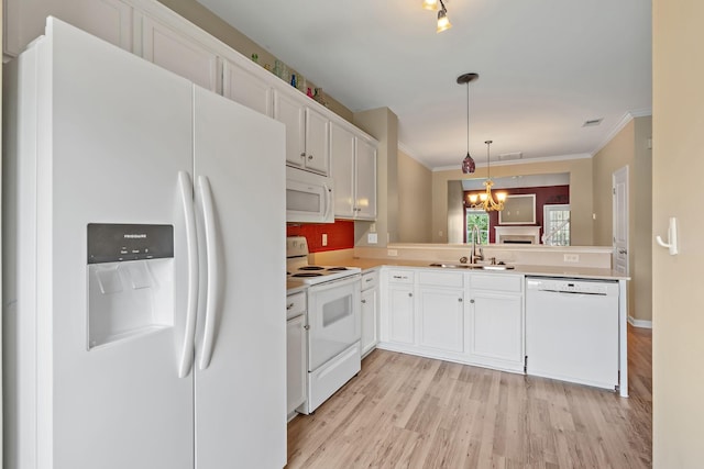245 Northcrest Commons Cir, Nashville, TN 37211 - kitchen with white appliances, light wood-type flooring, white cabinetry, decorative light fixtures, and crown molding