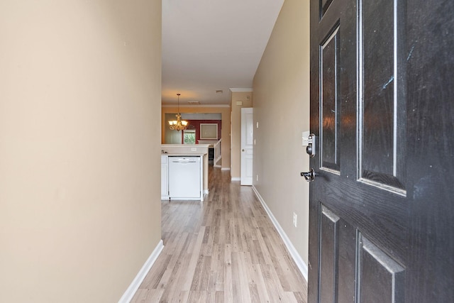 245 Northcrest Commons Cir, Nashville, TN 37211 - foyer with a chandelier, light wood finished floors, and crown molding
