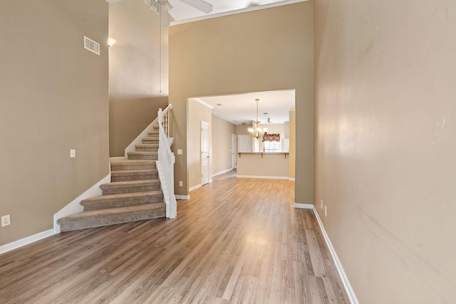 245 Northcrest Commons Cir, Nashville, TN 37211 - foyer entrance featuring light wood-style flooring, a chandelier, stairway, and a ceiling fan