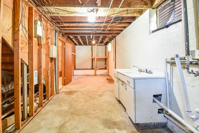 1204 Rolling Fields Dr, Columbia, TN 38401 - unfinished below grade area with a sink and concrete block wall