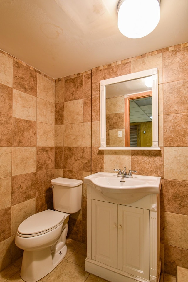 1204 Rolling Fields Dr, Columbia, TN 38401 - half bathroom with tile walls, vanity, and tile patterned flooring