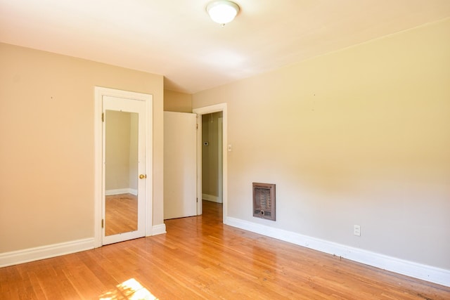 1204 Rolling Fields Dr, Columbia, TN 38401 - spare room with heating unit and light wood-style floors