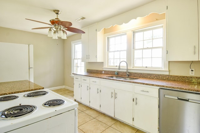 1204 Rolling Fields Dr, Columbia, TN 38401 - kitchen with white appliances, a ceiling fan, light tile patterned floors, and white cabinetry
