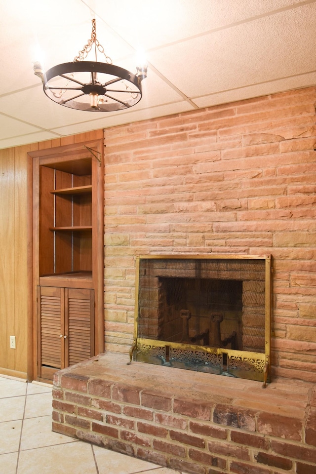 1204 Rolling Fields Dr, Columbia, TN 38401 - detailed view of a fireplace with raised hearth and wood walls