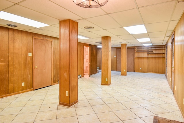 1204 Rolling Fields Dr, Columbia, TN 38401 - finished below grade area with wooden walls, a drop ceiling, and light tile patterned flooring