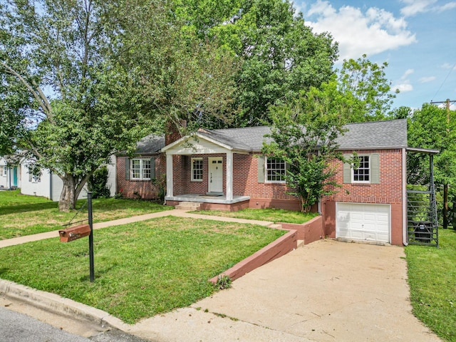 1204 Rolling Fields Dr, Columbia, TN 38401 - view of front of house featuring concrete driveway, brick siding, a garage, and a front lawn