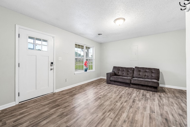 408 Eddy St, Oak Grove, KY 42262 - entrance foyer with wood finished floors and a textured ceiling