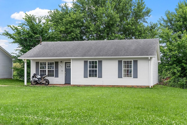 408 Eddy St, Oak Grove, KY 42262 - view of front of home featuring a front lawn and roof with shingles
