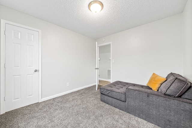 408 Eddy St, Oak Grove, KY 42262 - unfurnished room with carpet flooring and a textured ceiling